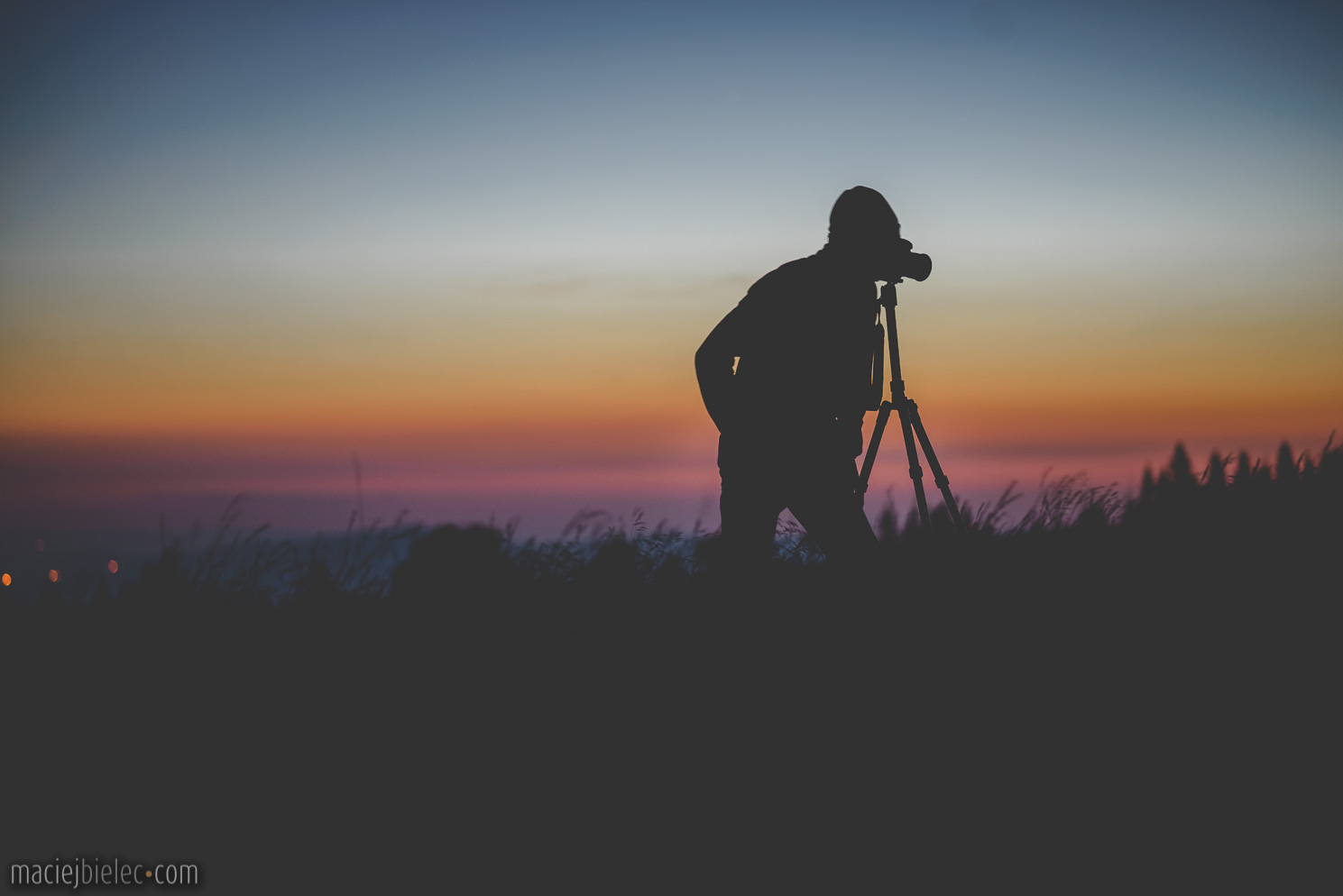 Fotograf podczas zachodu słońca